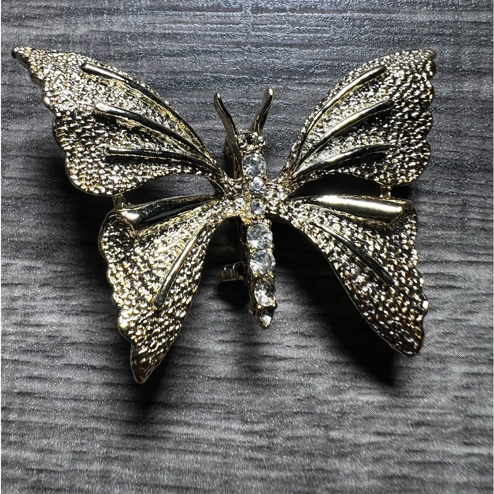 Gerry's Gold toned with clear rhinestones